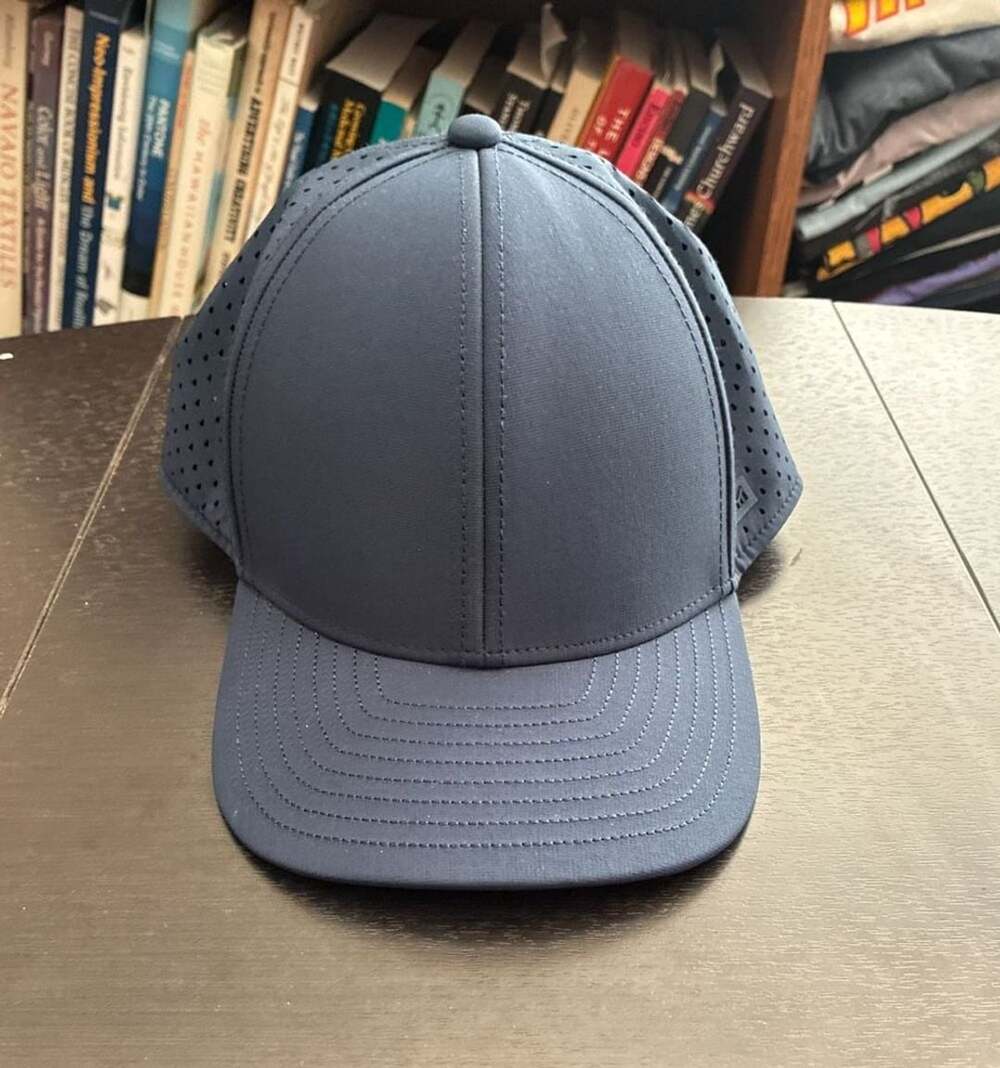 Melin A-Game Hydro Navy Blue Perforated Snapback Trucker Hat